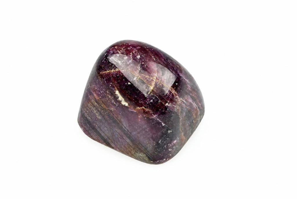 A polished, rounded stone with deep purple and dark brown bands on a white background.