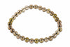 A bracelet of round, translucent beads in shades of brown and yellowish-green on a white background.