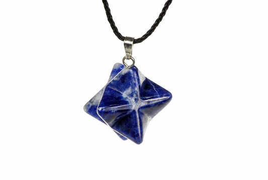 A blue sodalite pendant shaped like a star, hanging from a black cord on a white background.