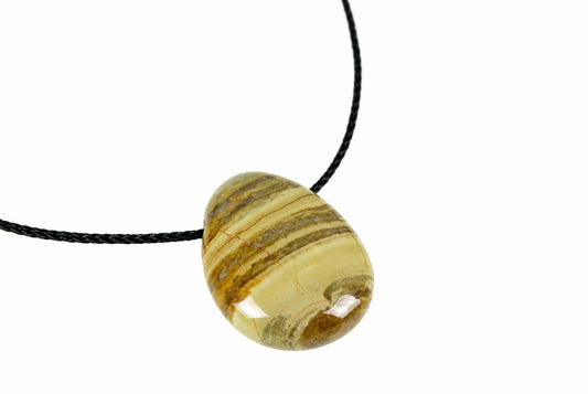 A polished, teardrop-shaped pendant with horizontal stripes of cream, brown and tan on a black cord against a white background.
