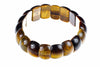 A bracelet with polished, rounded beads in dark brown and golden-brown tiger eye stone on a white background.