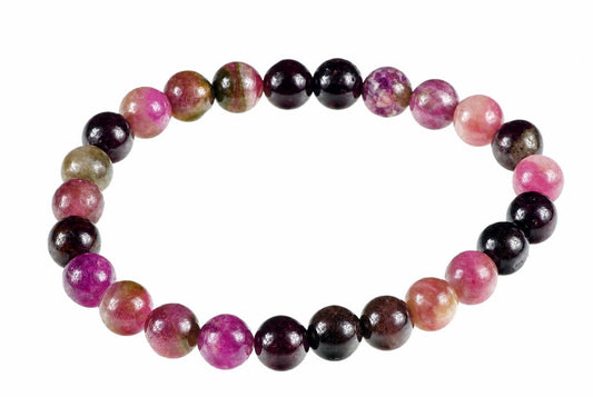 A bracelet of round beads in pink, purple, dark brown and greenish tones on a white background.