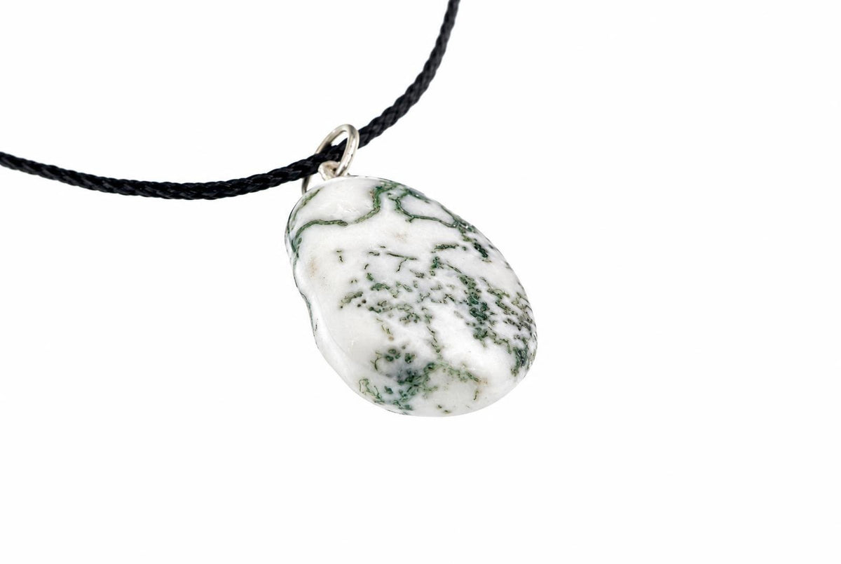A white and green tree agate pendant on a black cord, set against a plain white background.